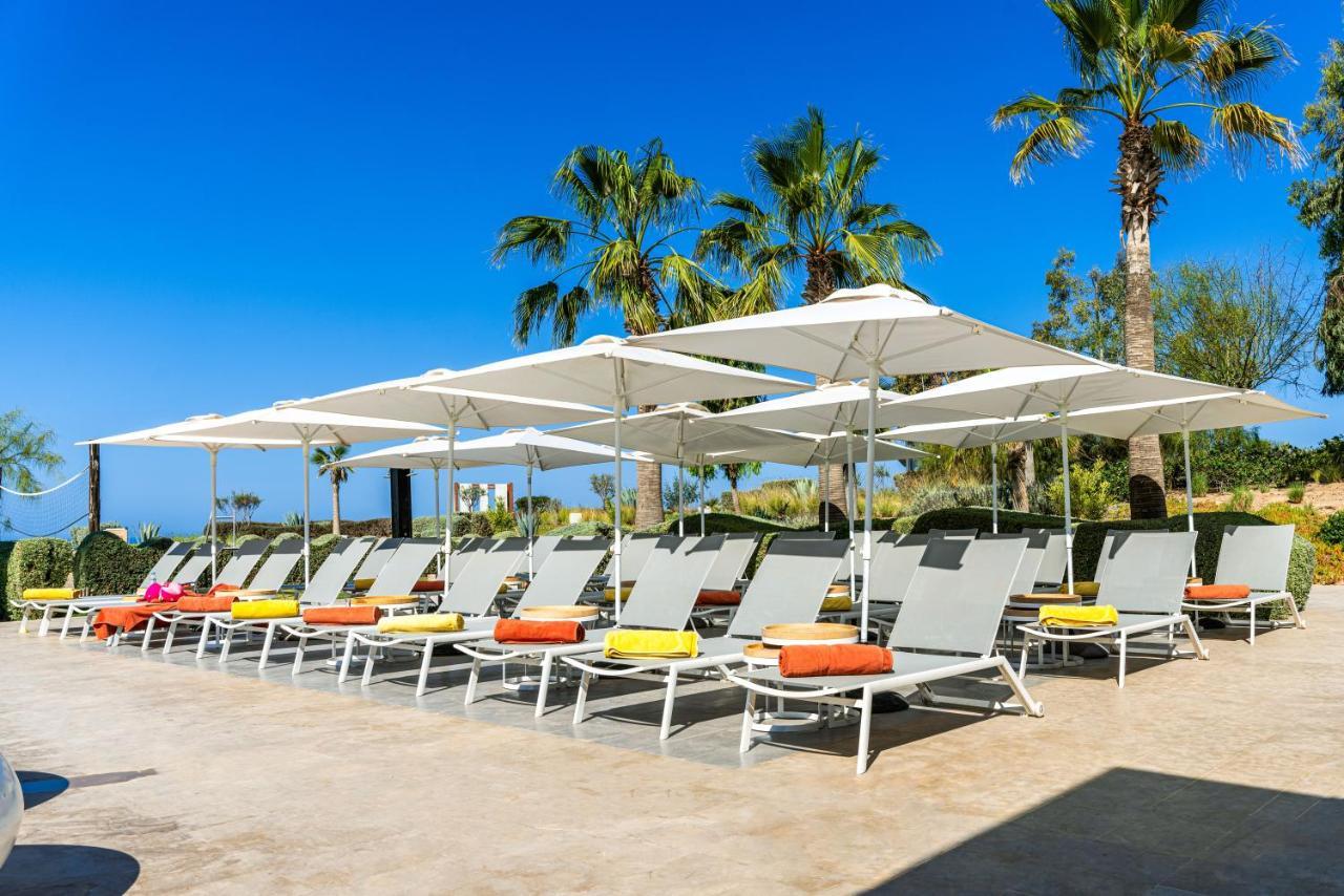 Hyatt Place Taghazout Bay Exteriör bild Beach chairs and umbrellas